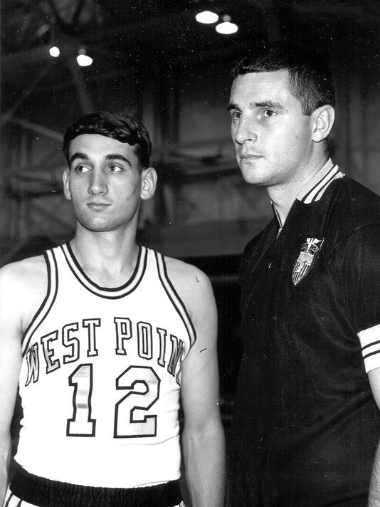 Mike Krzyzewski, point guard at Army in basketball jersey with Bob Knight, coach at Army Academy in 1960's.